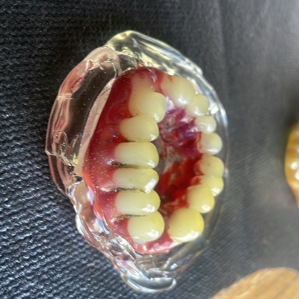 Unique Unused Glass Tooth Ashtray with Red and Yellow Accents.